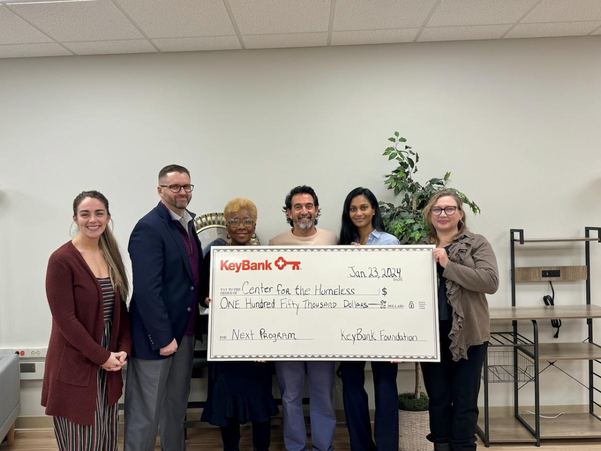 The Center for Homeless in South Bend team shown with a $150,000 grant check.