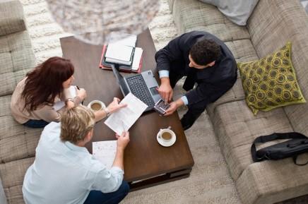 Aerial shot of three people working in office
