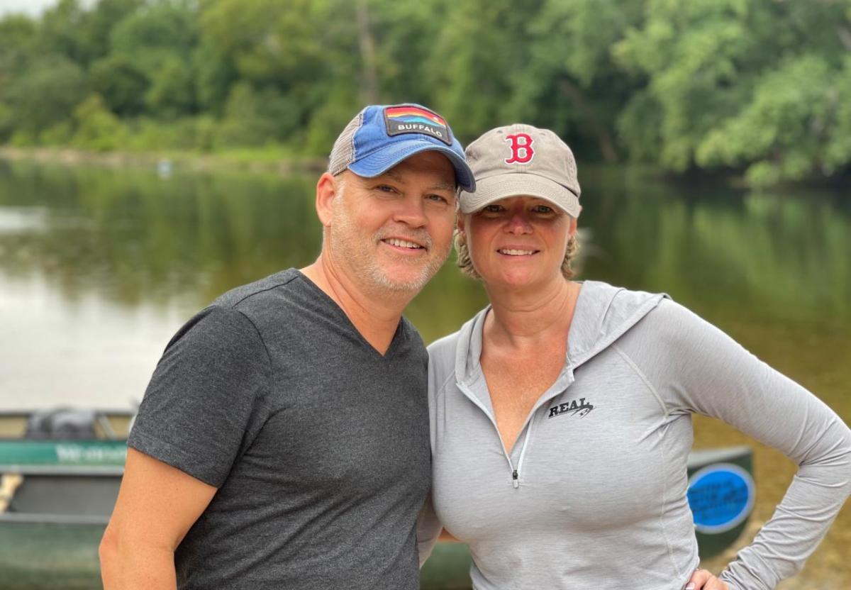 Clarise Ashworth and another posed with a body of water behind them.