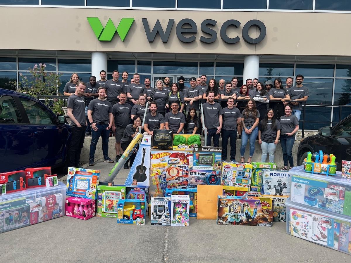 Wesco Team shown with their donations.