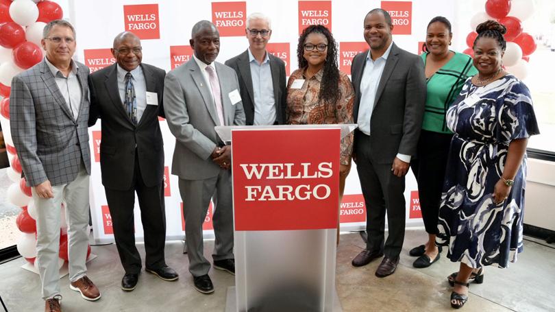 With $6.8 million in grant funding from Wells Fargo and the Wells Fargo Foundation, seven nonprofits will expand their work in housing and small business growth. Pictured right to Left: Darlene Goins, Wells Fargo Foundation; Elizabeth Wattley, Forest Forward; Dallas Mayor Eric L. Johnson, Alexis Snow, Wells Fargo; Wells Fargo Chairman and CEO Charlie Scharf; Dr. Terry Flowers, St. Philips School and Community Center; Pastor Chris Simmons, Cornerstone CDC; and Scott Fontenot, Wells Fargo.