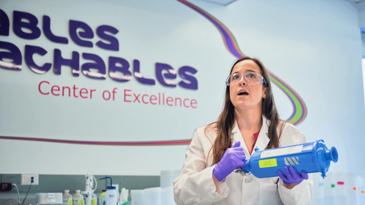 MilliporeSigma scientist holds product