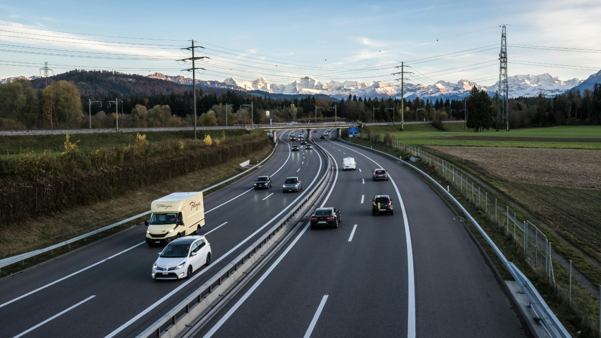 A highway with power lines in the background
