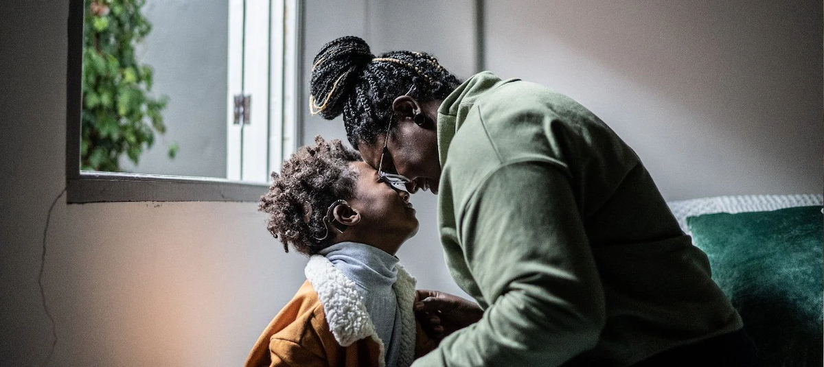 A couple embracing.