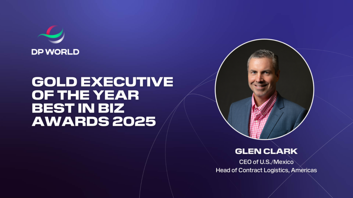 Graphic announcing Glen Clark as Gold Executive of the Year in the 2025 Best in Biz Awards. The left side features the DP World logo and bold white text on a purple–blue gradient background. On the right is a circular headshot of Glen Clark, wearing a blue blazer and pink checkered shirt, smiling against a dark backdrop.