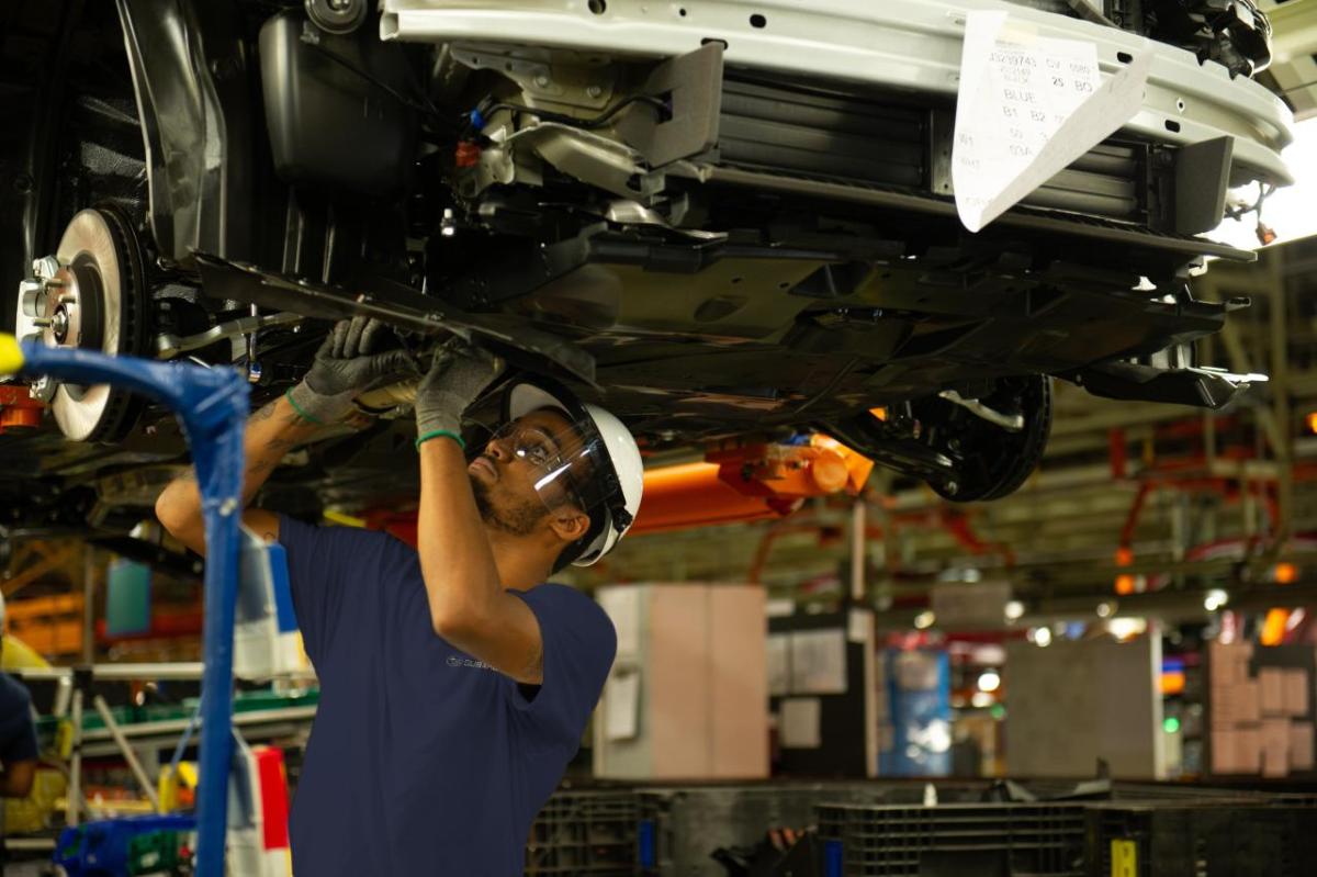 person working on a vehicle