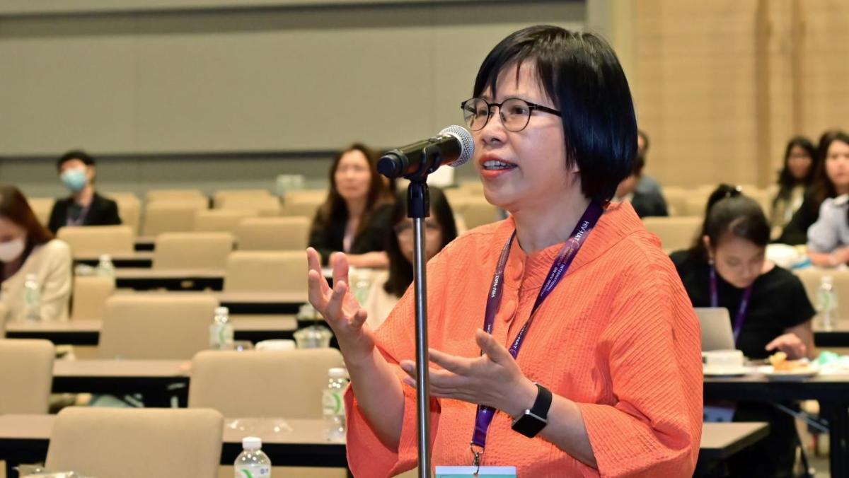 speaker at microphone