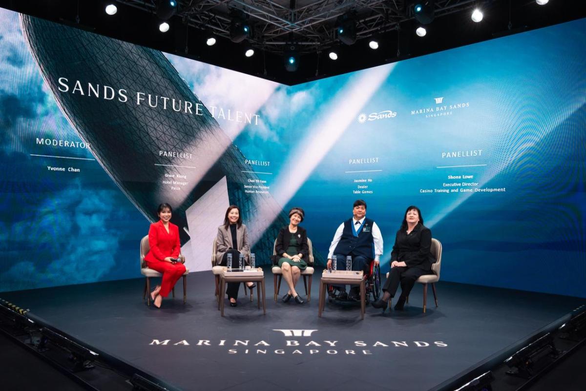 Five panelists seated together