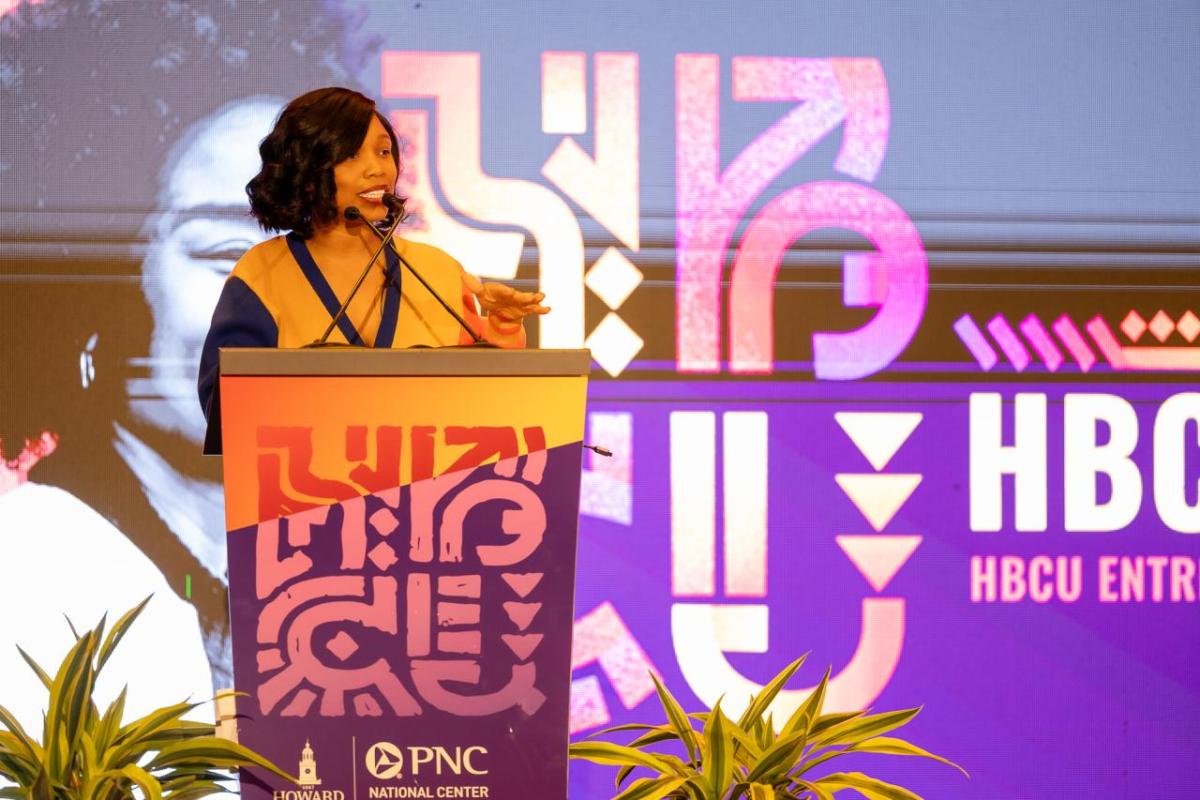 Woman speaking at podium