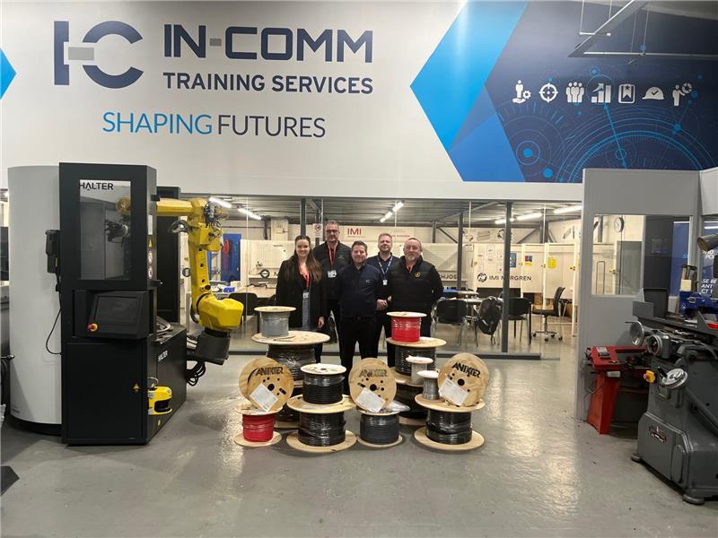 From left to right: Sophie Whitfield, Sean Tully, Paul Hodgetts, Simon Wood and Allan Mitchell with the donated cable at In-Comm training Walsall. 