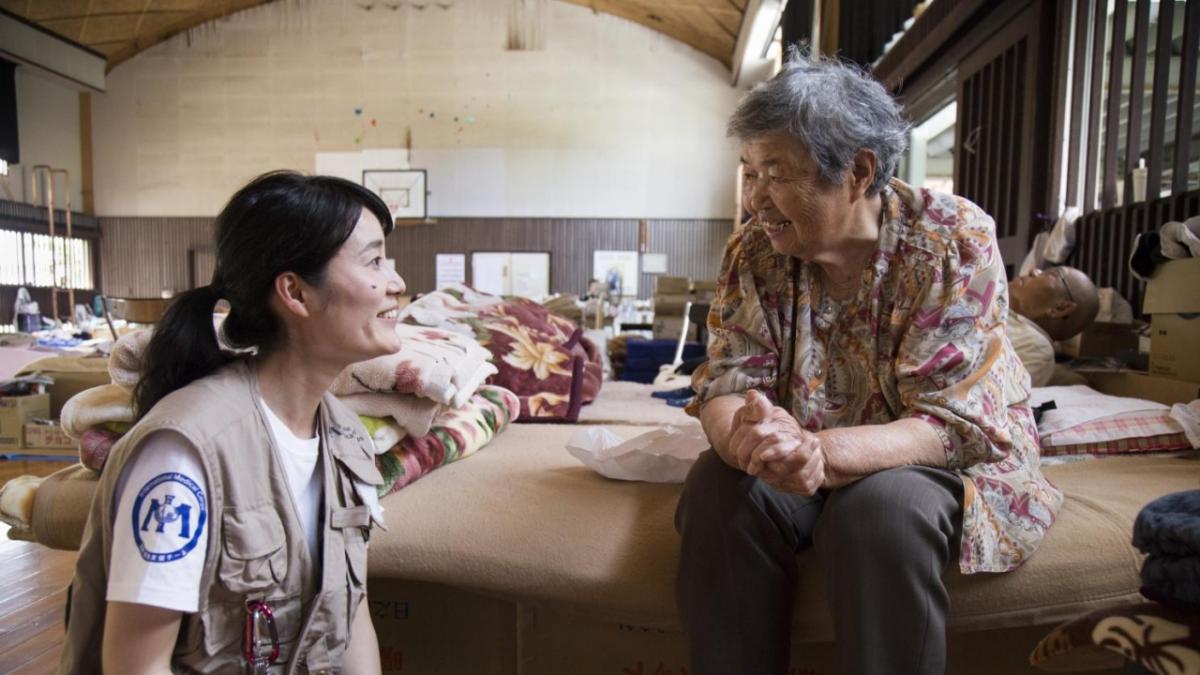 International Medical Corps worker with patient