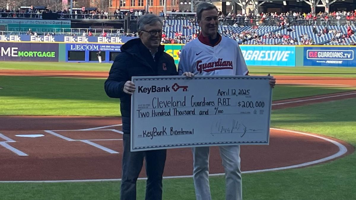 Chris Gorman presented the donation from the KeyBank Foundation to Cleveland Guardians Owner, Chairman and CEO Paul Dolan during “KeyBank Bicentennial Night” on April 12th at Progressive Field. 