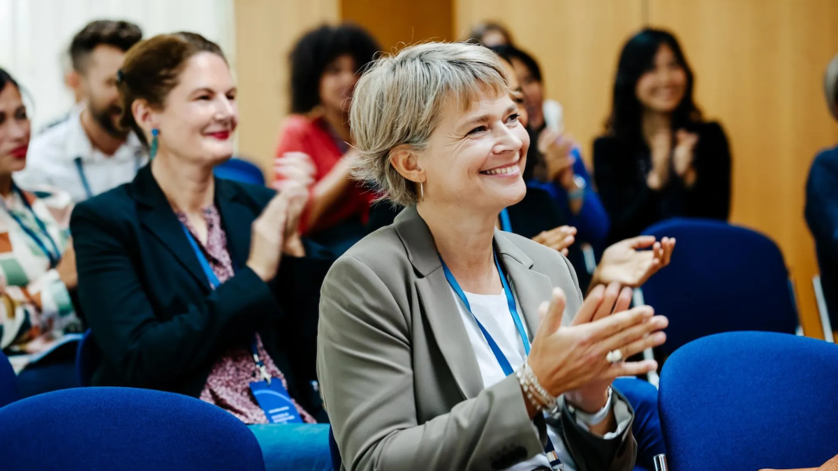 Group of people attending a conference.