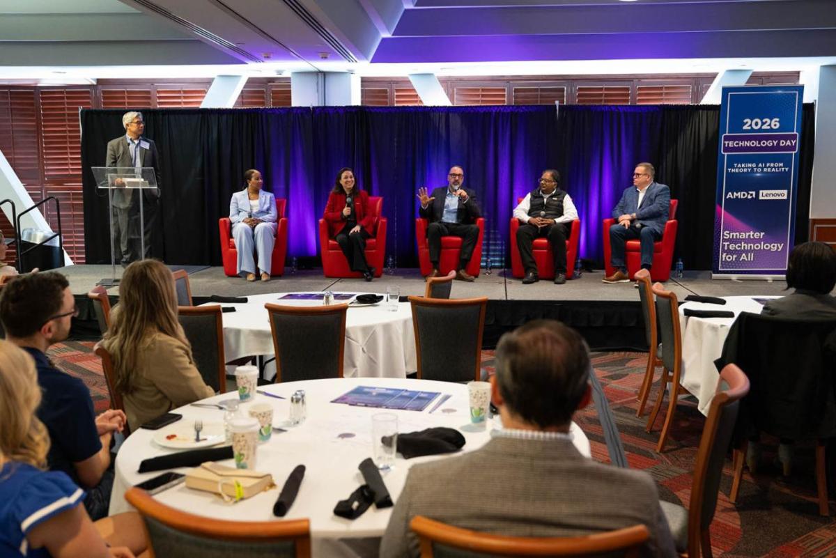 A seated panel on a stage