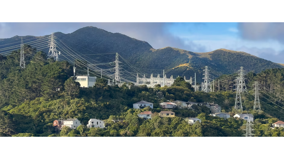 Power lines with mountains in the background