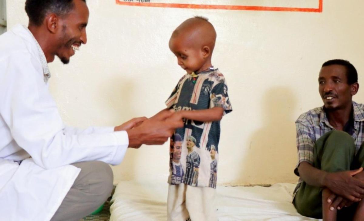 Nuredin, a staff member at the Action Against Hunger-supported health clinic, takes joy in helping Gebremedihin’s son recover.