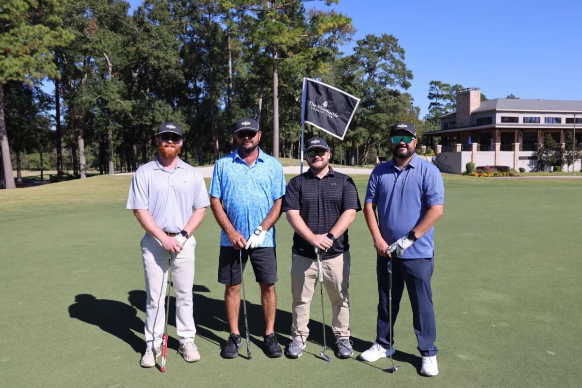 Four golfers