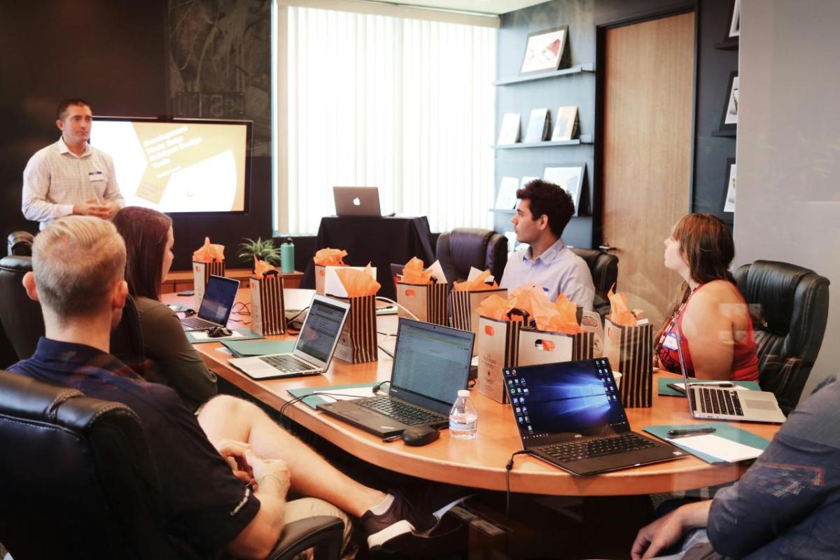 Employees in a conference room.