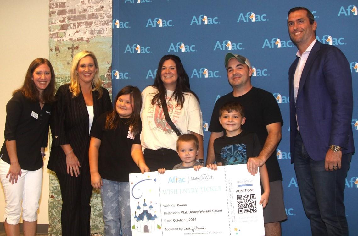 Rowan and family shown with Aflac and Make-A-Wish South Carolina representatives.