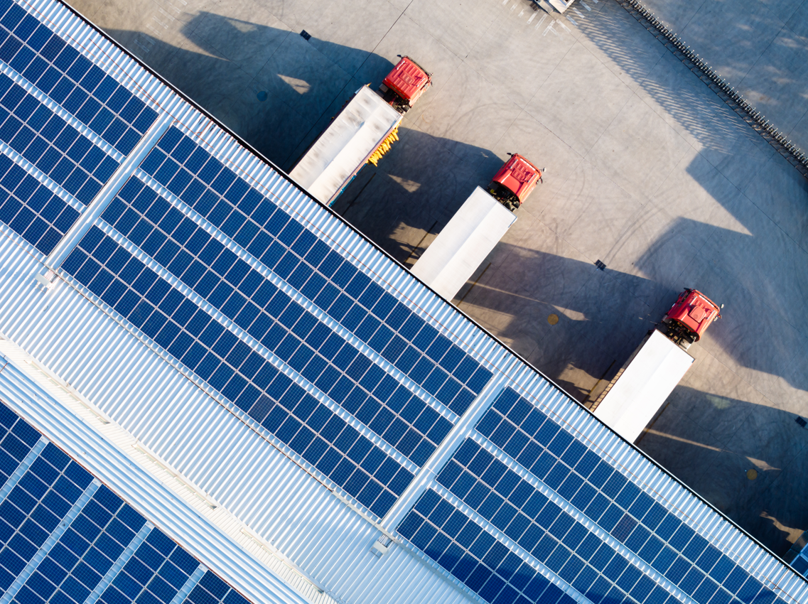 solar panels and truck trailer at rooftop facility