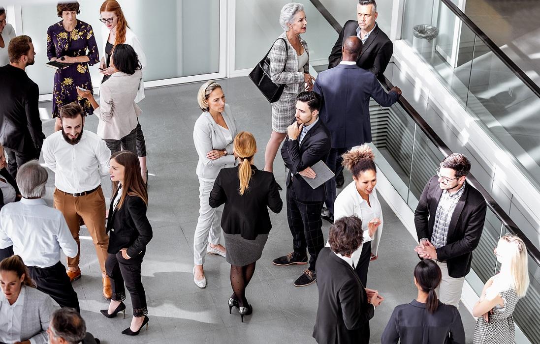 Group of people standing in conversation
