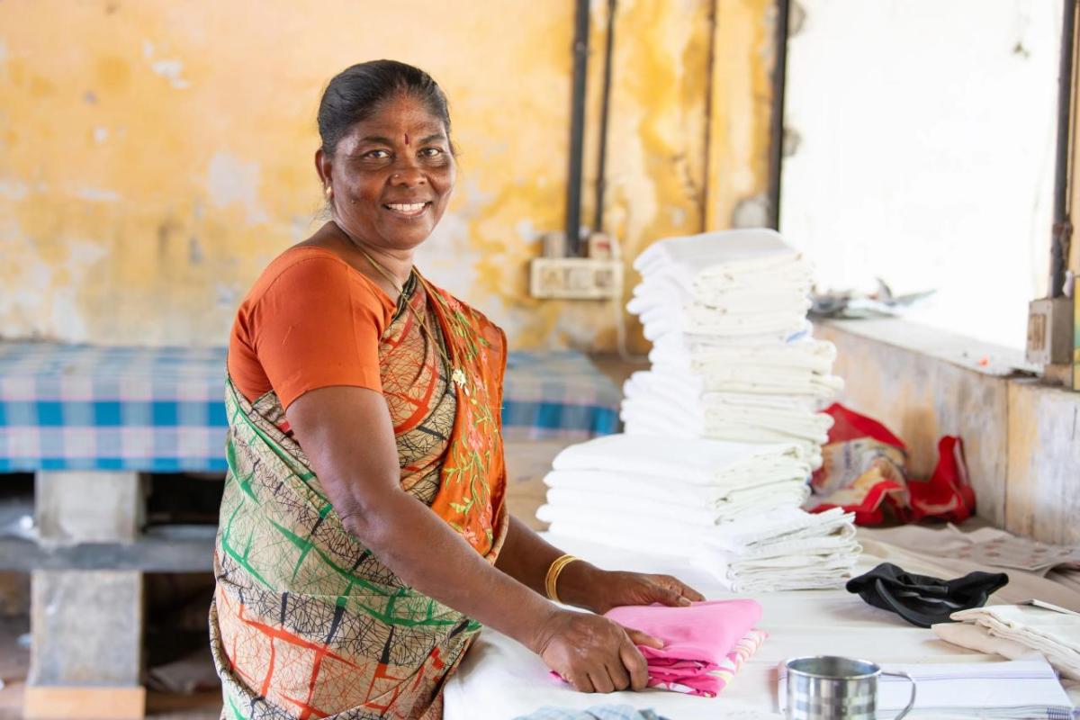 Woman folding cloth