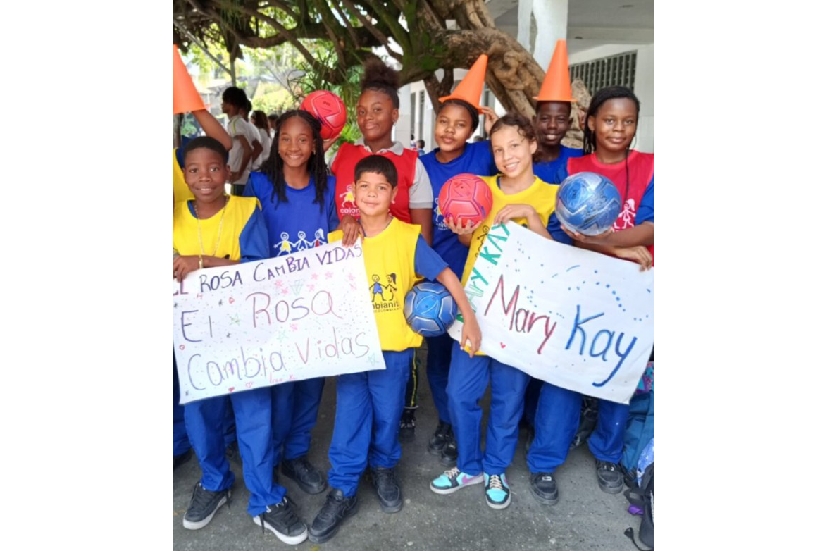 students holding up signs