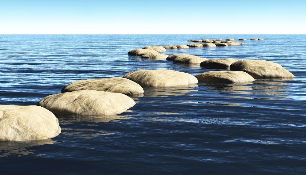 stepping stones leading out into water