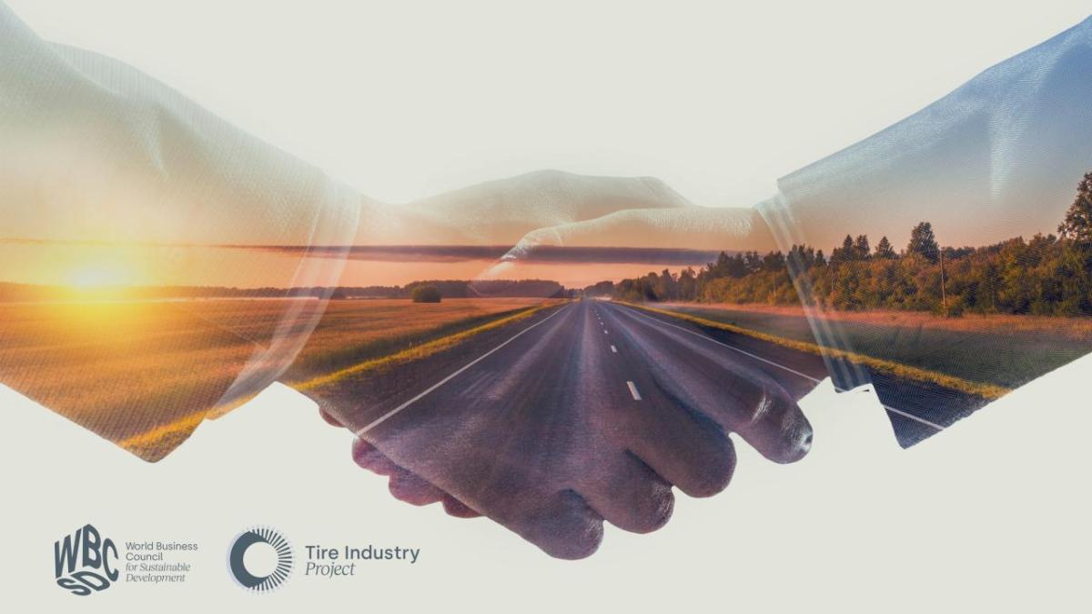 A handshake overlayed with a highway at sunrise