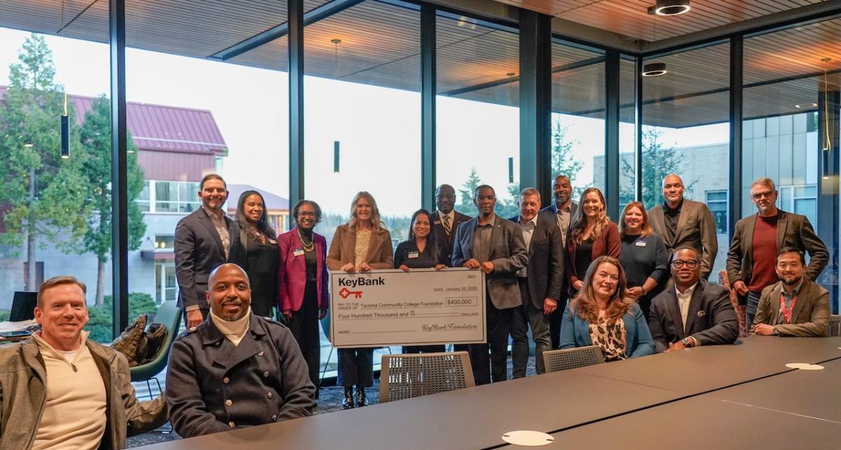 Representatives from Tacoma Community College and KeyBank shown with a $400,000 grant check.