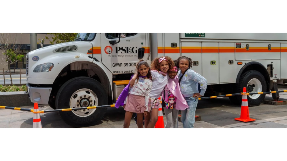 kids in front of a work truck