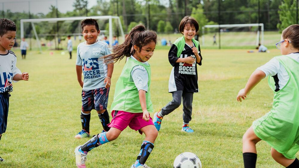 children playing soccer