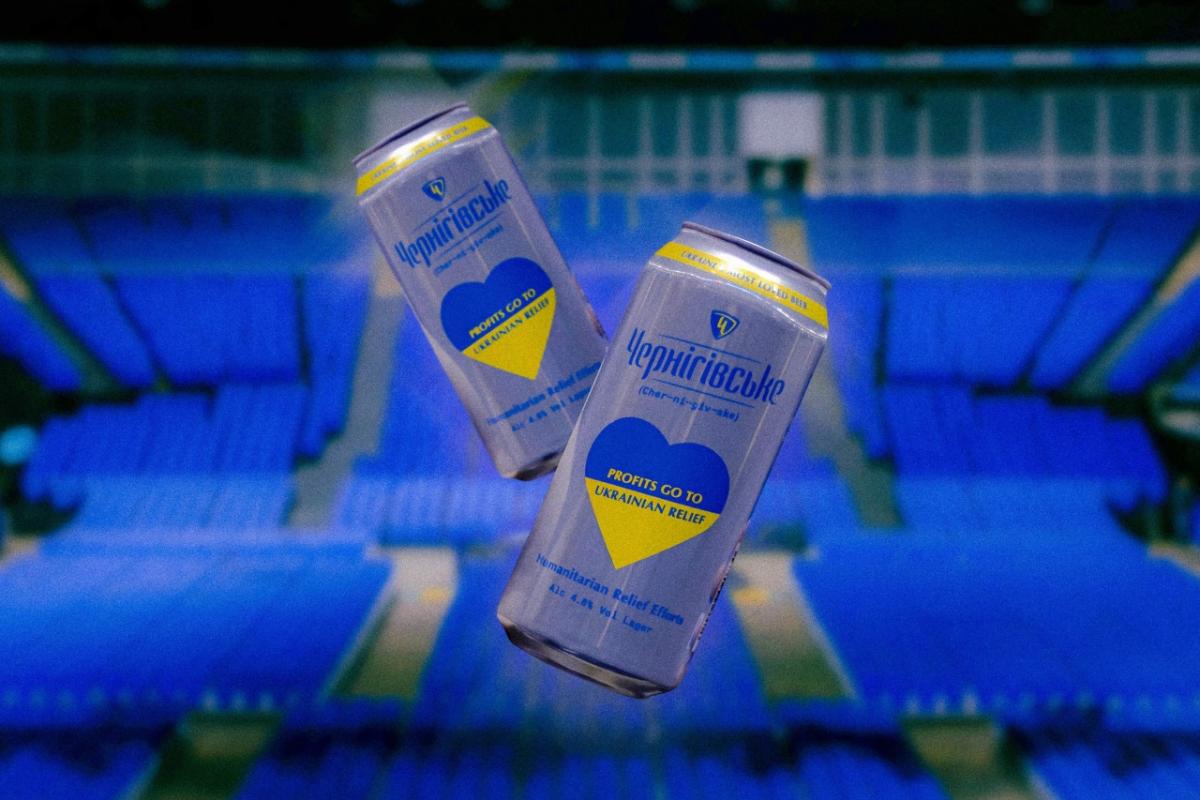 2 cans of alcohol shining blue and yellow