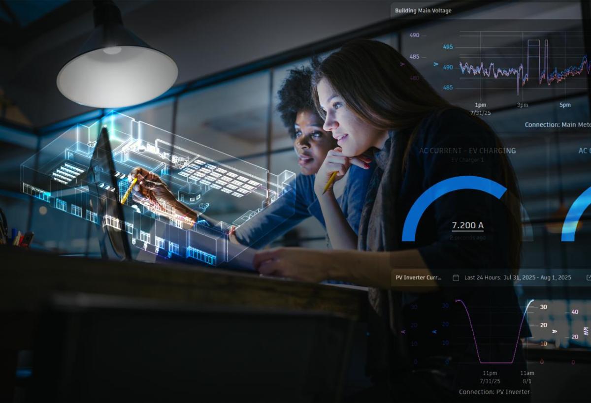 Two people looking at a screen