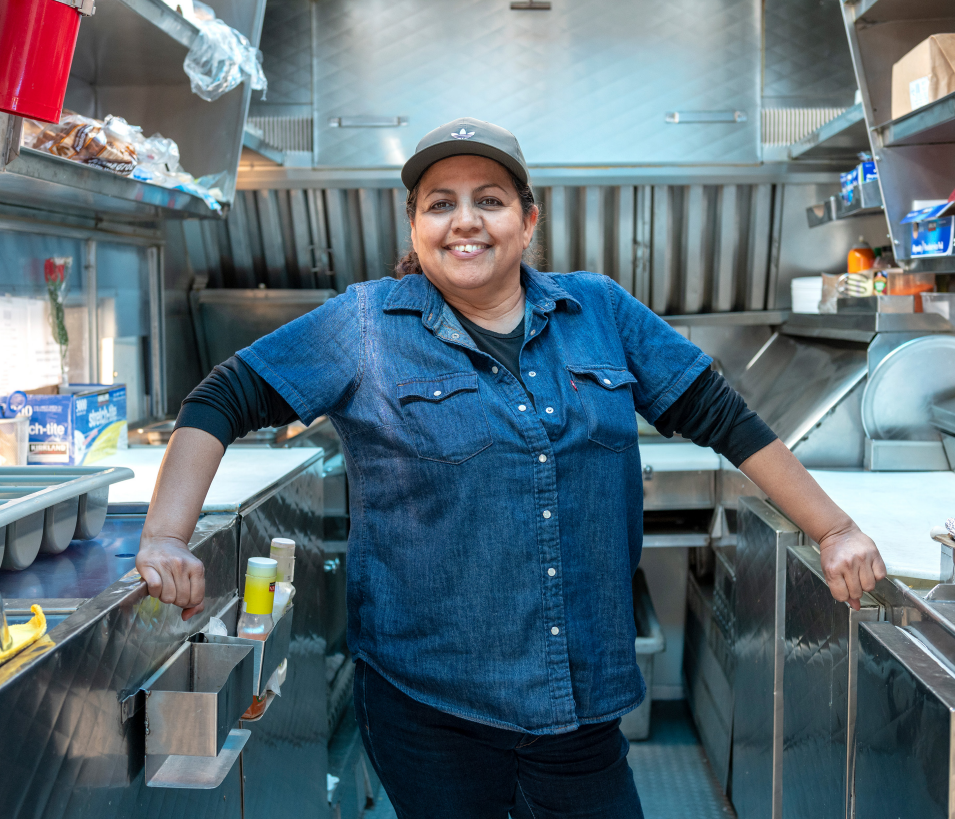 Person standing in a professional kitchen