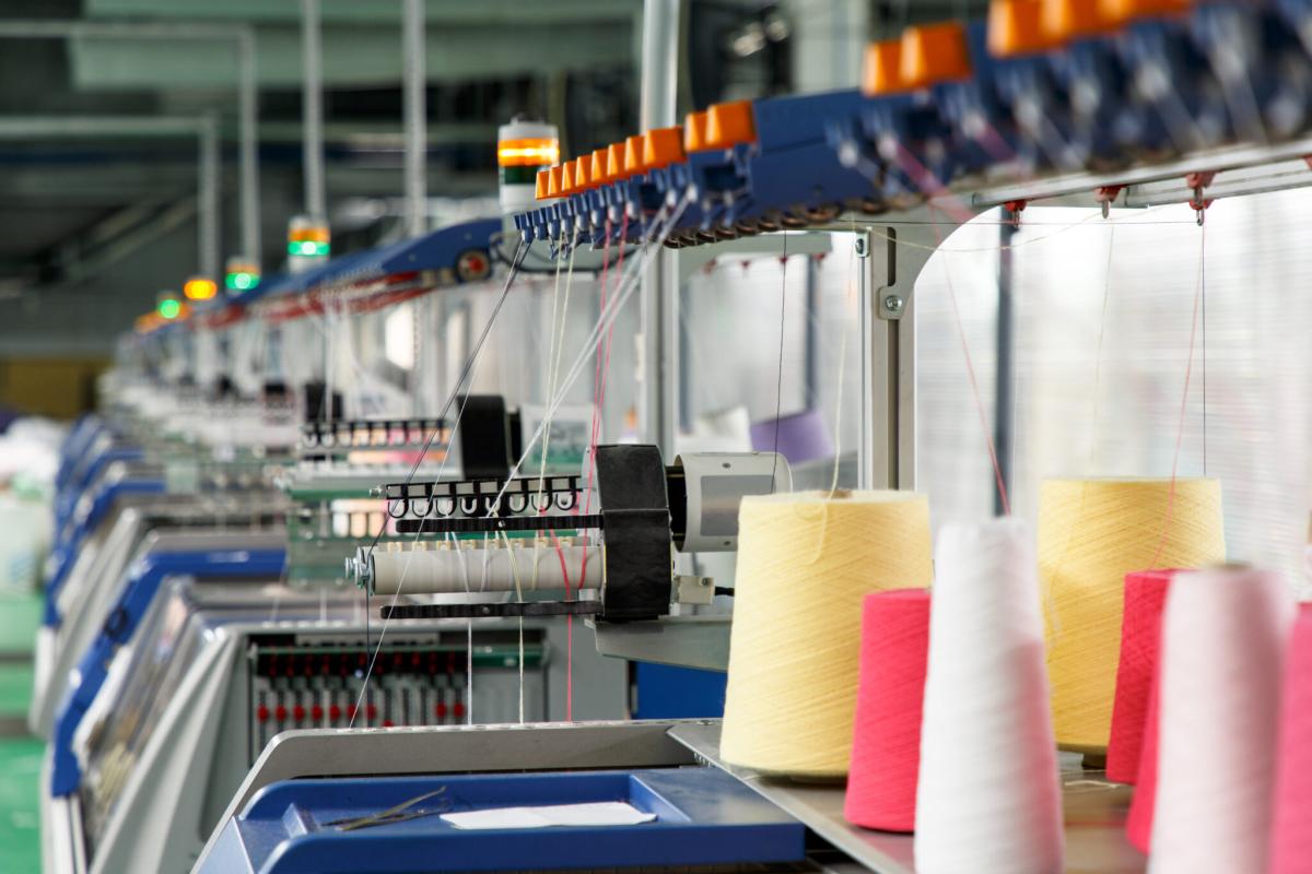 spools of thread in a factory