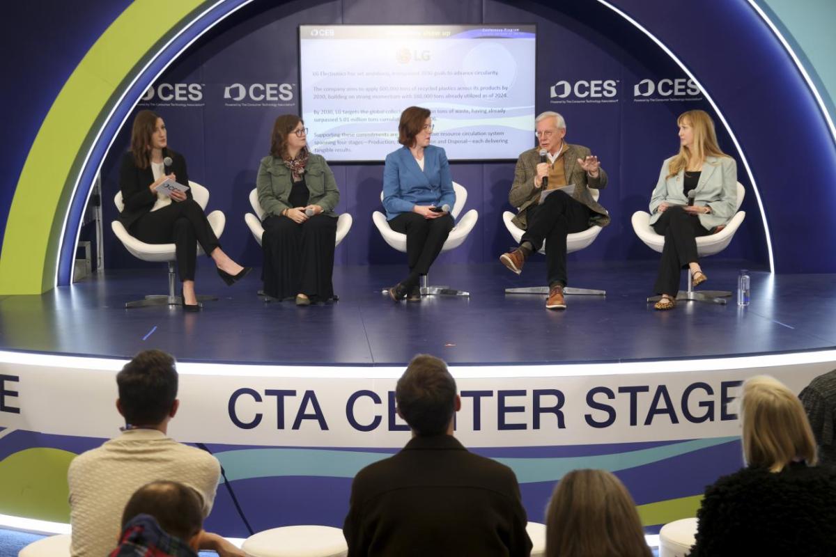 panel of people sitting on a stage