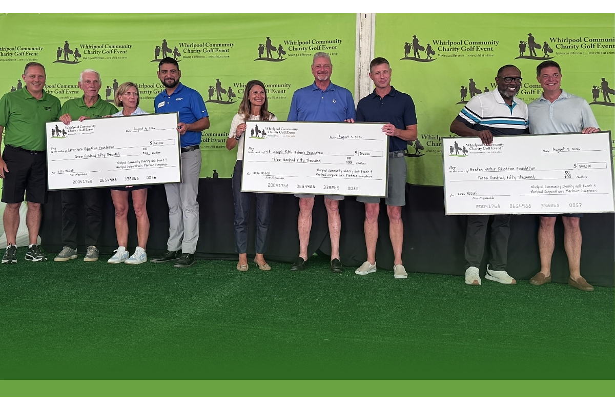 people holding up charity checks