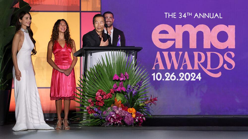 Four people on stage at the 2024 EMA Awards