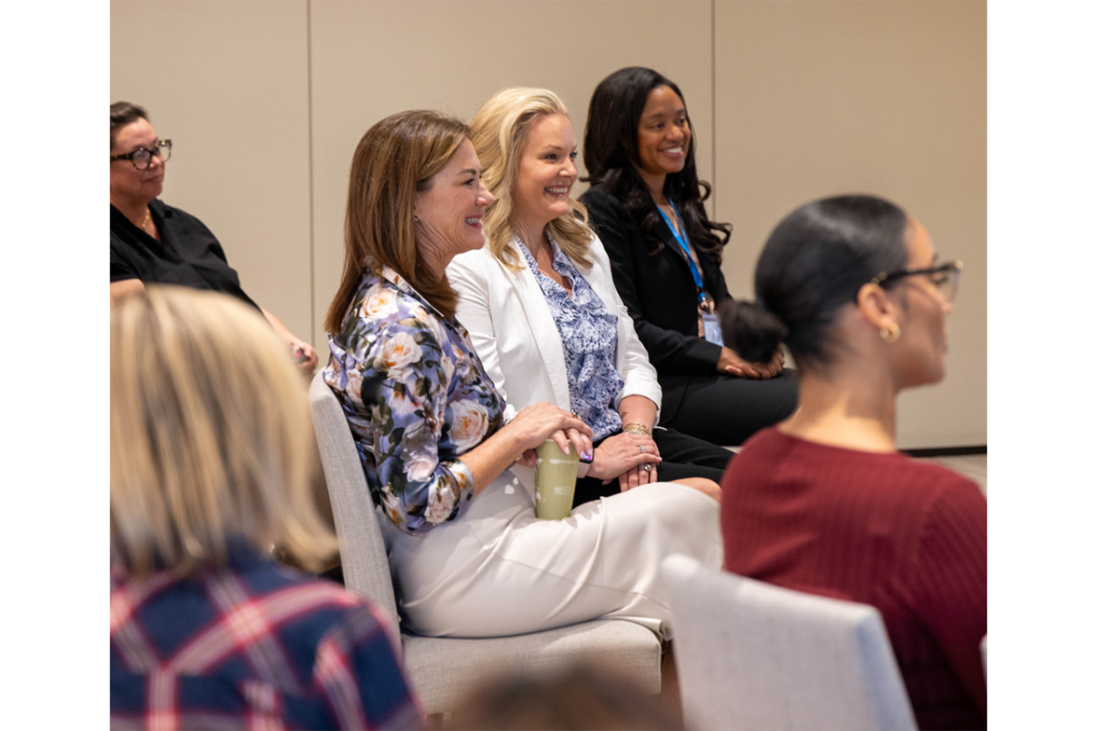 Women seated at an event