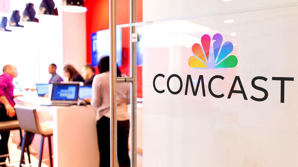Inside a building with the Comcast logo on the door 