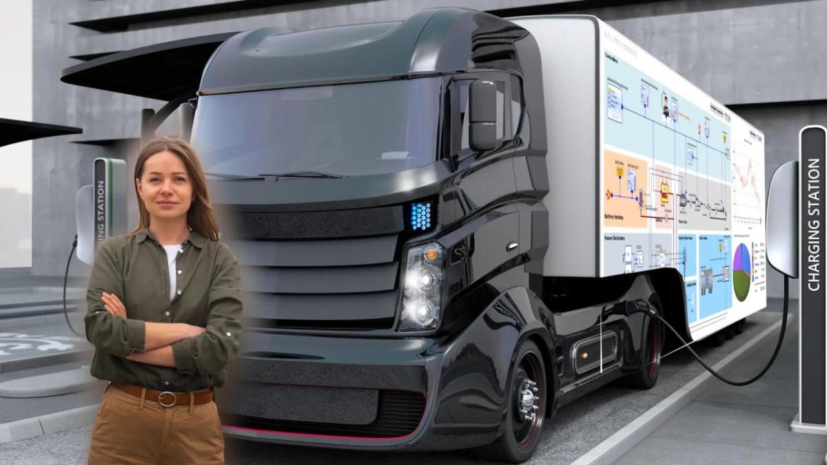 Lara in front of her truck