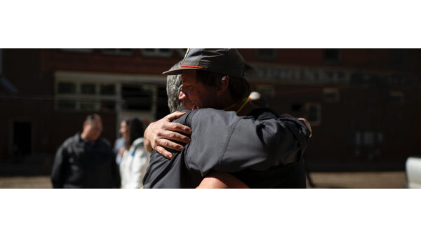 Two people hugging