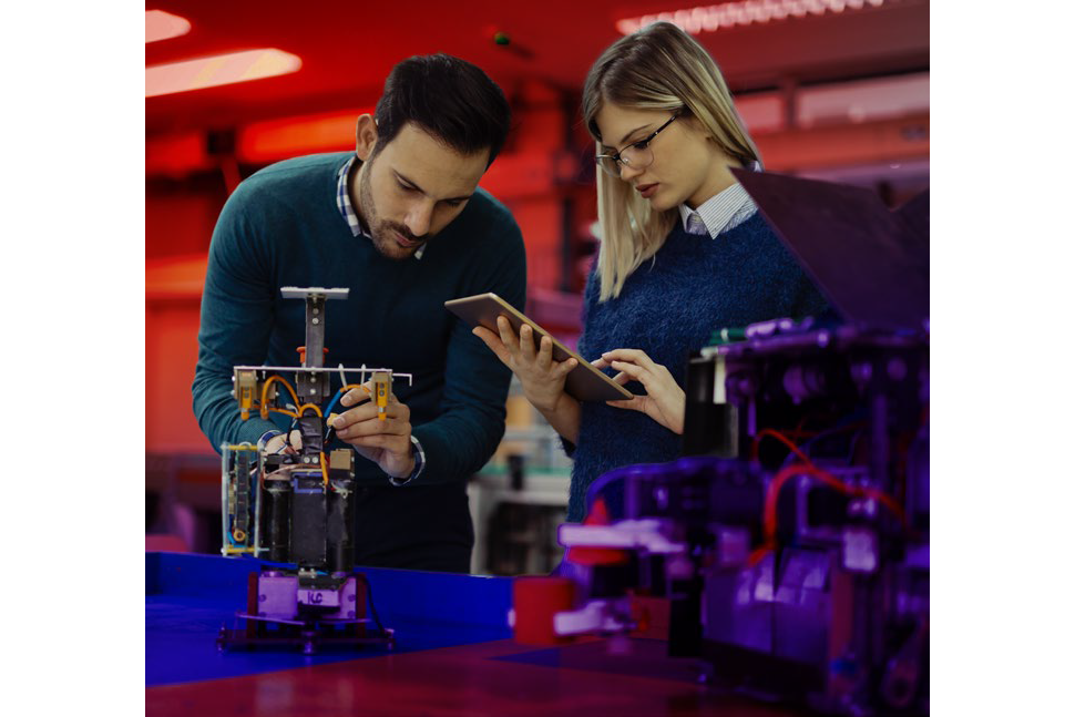 Two people working on a project together