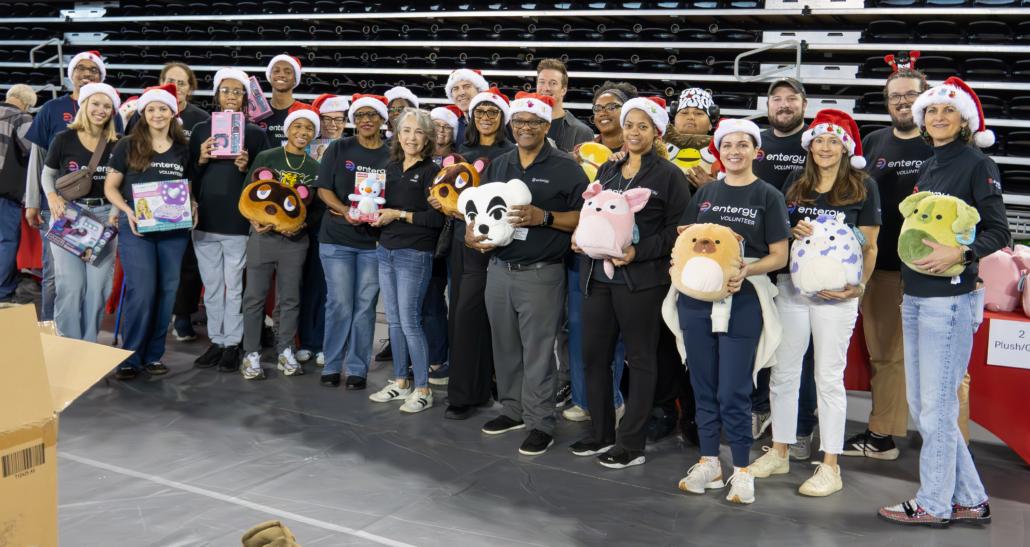 A group of people standing with toys