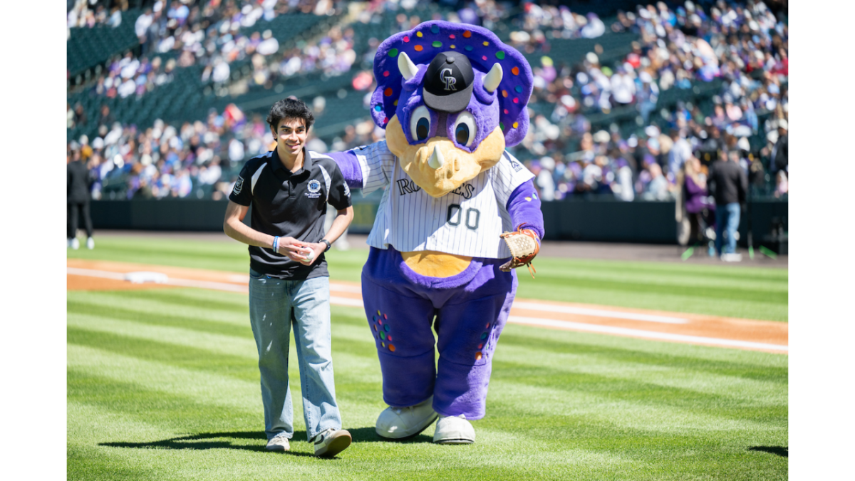 person walking with mascot