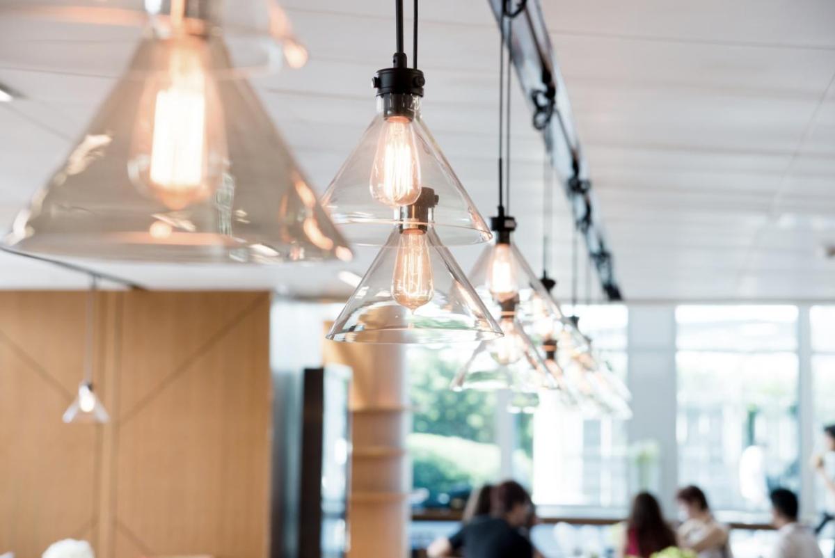 A row of lights hanging from a ceiling