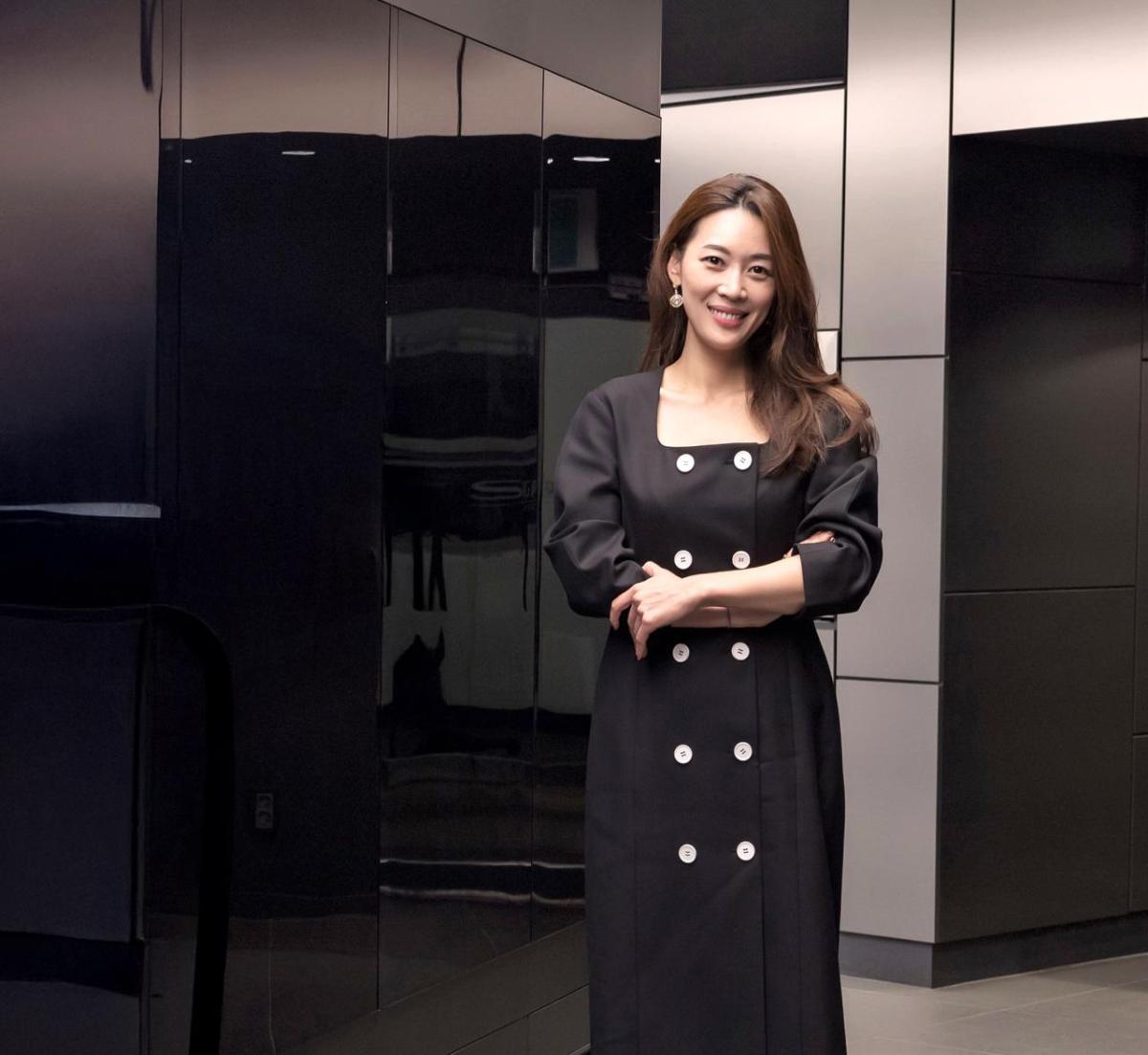 person standing and smiling