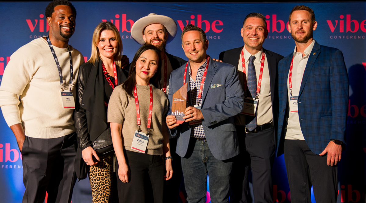 A group holding an award