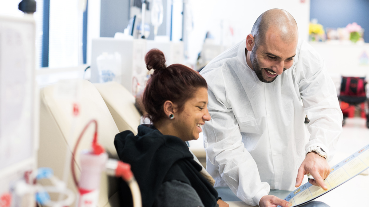 person working with a nurse